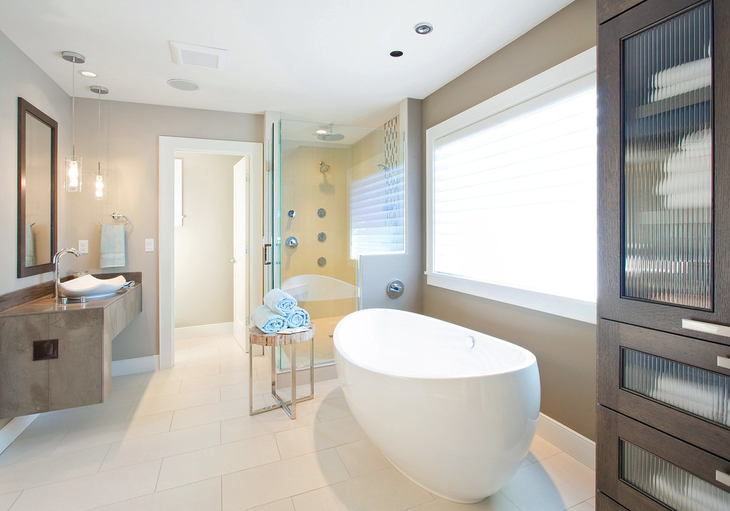 Fully refitted family bathroom with freestanding bath and walk-in shower